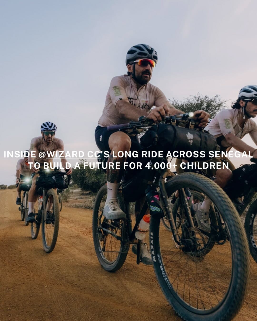 Cyclists from Wizard Cycling Crew riding through Senegal terrain during their ten-day journey to support the Socio-Cultural Centre of Thiès